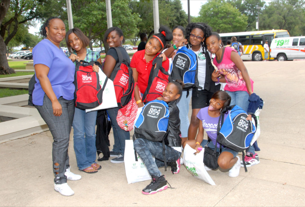 DSC_8716-Students showoff their Keepin' It Real! backpacks.